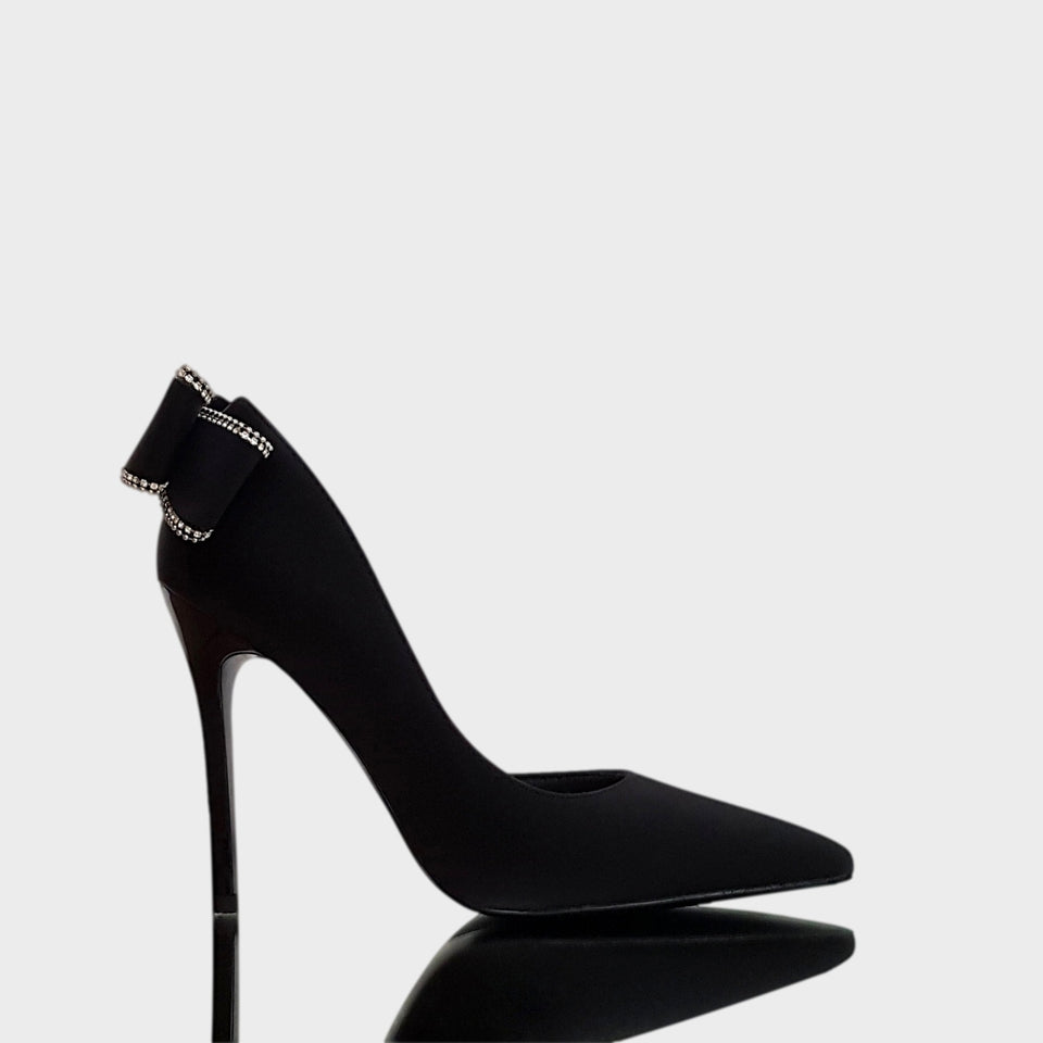 La chica de los stilettos Stilettos Vivien Black en Material Sintético Negro con Moño en el Talón y Taco Acrílico al tono de 10.5 cm
