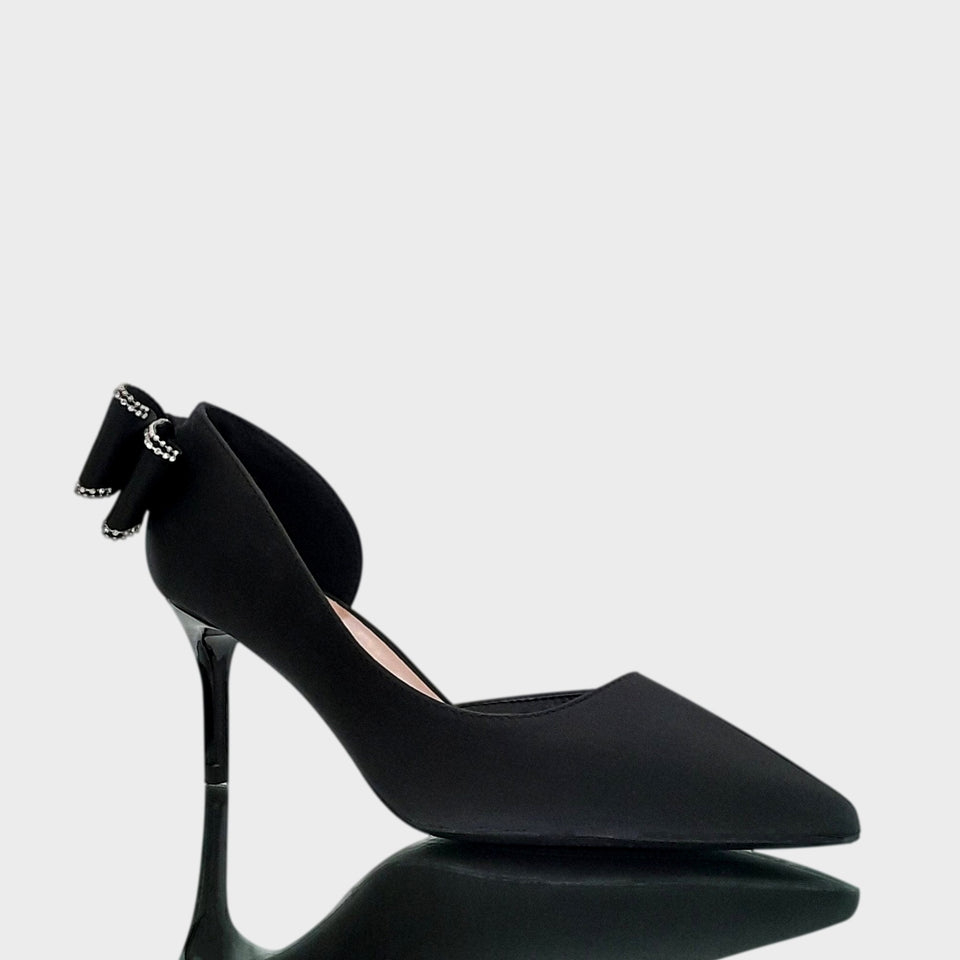 La chica de los stilettos Vista Lateral de Stilettos Vivien 15 Black en Material Sintético Negro con Moño en el Talón y Taco Acrílico al tono de 7 cm