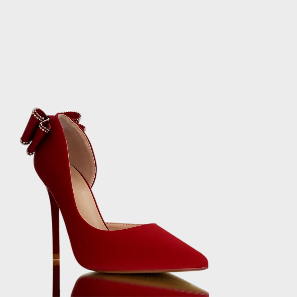 La chica de los stilettos Stilettos Vivien Red en Material Sintético Rojo con Moño con Strass en el Talón y Taco Acrílico Rojo de 10.5 cm Vista Lateral